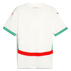 Puma Morocco 2025 away jersey in white with green zigzag trim and red horizontal stripe on back